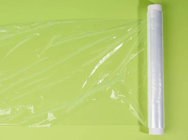 Rollo Película Transparente Para Embalaje Sobre Fondo Verde Vista Superior — Foto de Stock