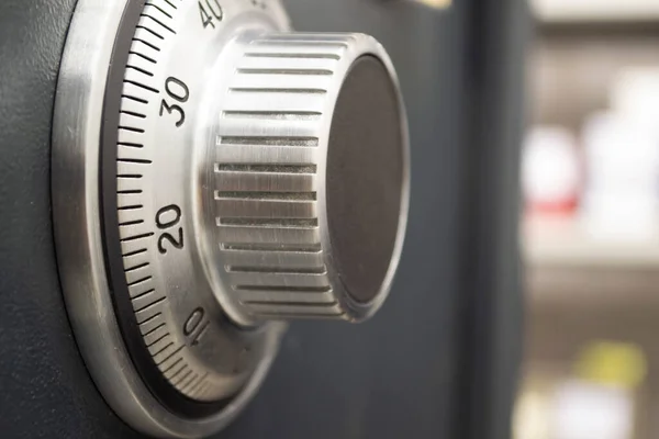 combination lock on the safe. closeup, gray safe