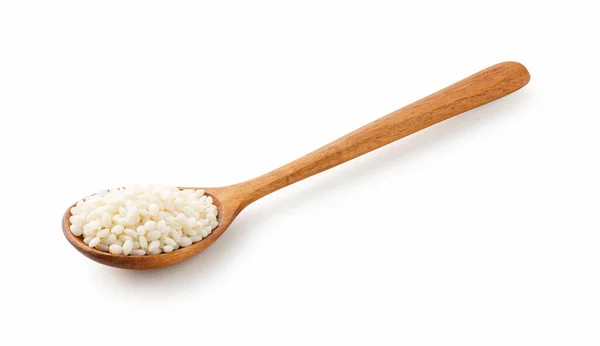 白を基調としたもち米と木のスプーン — ストック写真