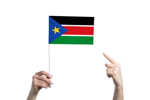 Uma Bela Mão Feminina Segura Uma Bandeira Sudão Sul Para — Fotografia de Stock