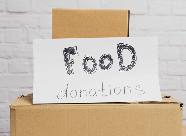 Stack Cardboard Boxes White Sheet Paper Inscription Food Donation White — Stock Photo, Image