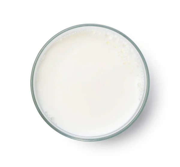 Mjölk Ett Glas Placerat Vit Bakgrund Utsikt Ovanifrån — Stockfoto