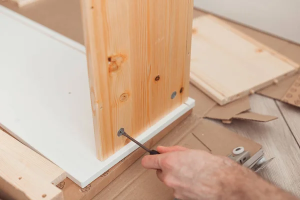 Man Assembling Wooden Board Screwdriver — Stock Photo, Image