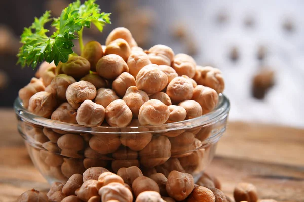 Composición Con Plato Garbanzos Sobre Mesa Madera —  Fotos de Stock