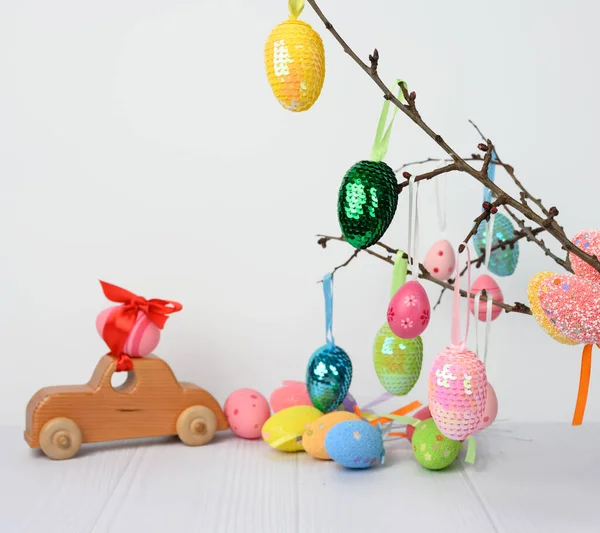 Wooden Toy Car Carrying Pink Easter Egg Fixed Red Ribbon — Stock Photo, Image