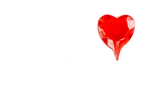 赤いハート形の白い背景で隔離のロリポップ — ストック写真