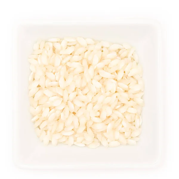 Rauwe Witte Rijst Een Kom Geïsoleerd Een Achtergrond — Stockfoto