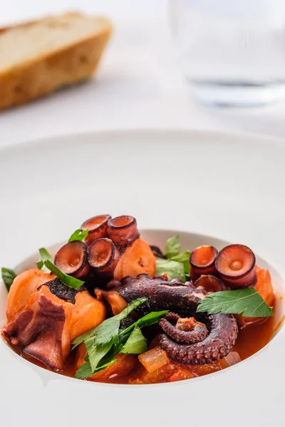 Stewed Octopus Squid Tomatoe Sauce Plate Bread Water Glass — Stock Photo, Image