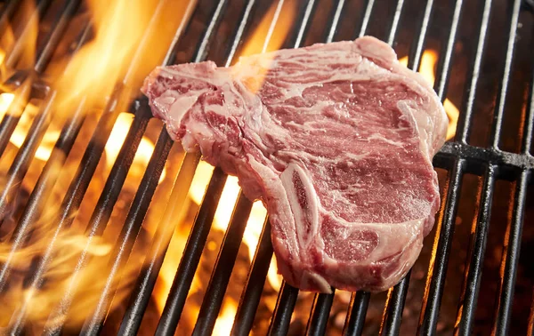 Raw Bone Pork Steak Grilling Bbq Fire Close Grid Flaming — Stock Photo, Image