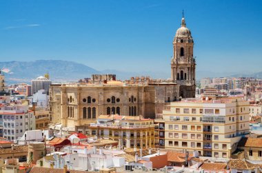 Cityscape aerial view of Malaga, with cathedral and city skyline Spain . clipart
