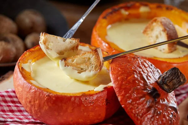 Traditional Swiss Fondue Melted Raclette Cheese Served Hollow Roasted Pumpkin — Stock Photo, Image