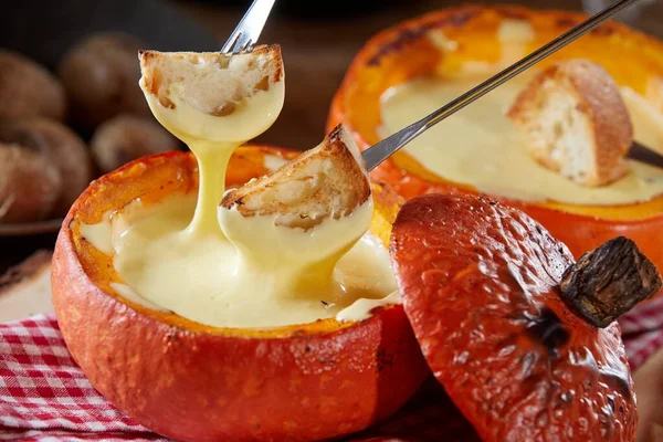 Delicious Raclette Melted Cheese Fondue Served Hollowed Pumpkin Toasted Baguette — Stock Photo, Image
