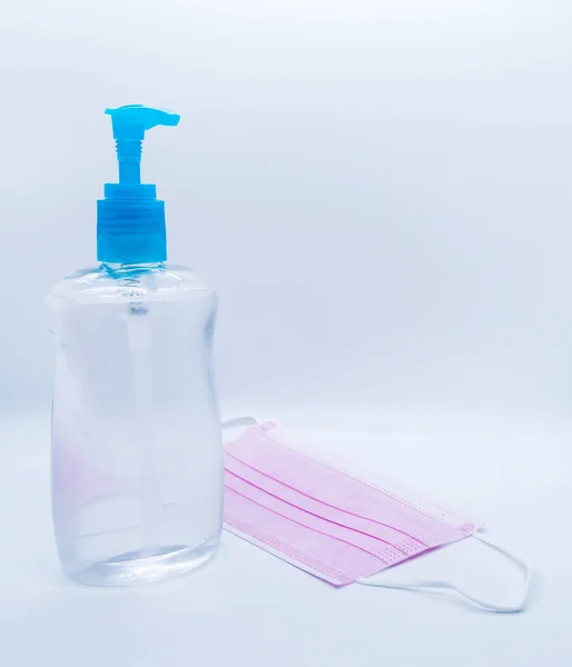 Sanitizer Jel Bottle Pink Face Masks Isolated White Background — Stock Photo, Image