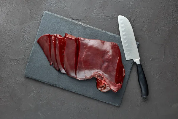 Raw Beef Livers Black Stone Cutting Board Dark Background Top — Stock Photo, Image