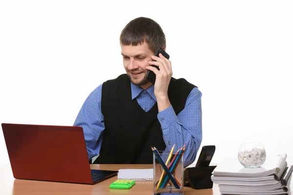 stock image Office worker talks on the phone with customers