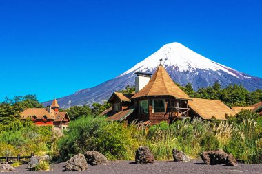 Lodge Petrohue with Osorno volcano, Chile clipart