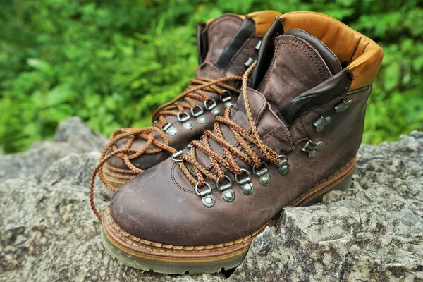 Mountain boots on a rock