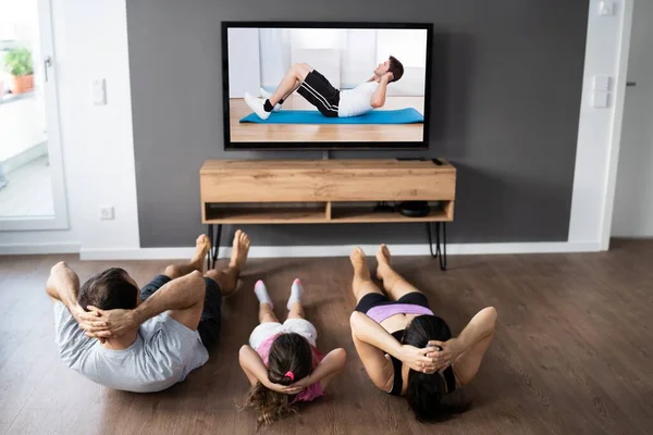 Family Family Doing Fitness Exercise While Watching — Stock Photo, Image