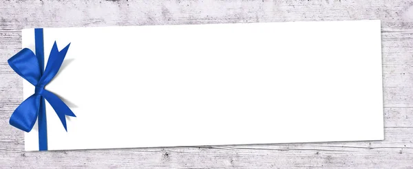 Λευκό Χαρτί Φιόγκο Ξύλινο Φόντο — Φωτογραφία Αρχείου