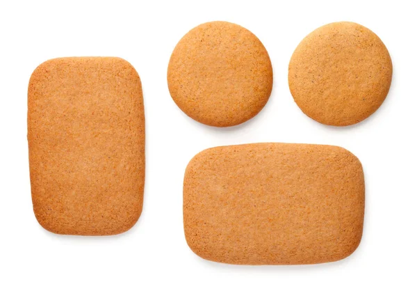 ジンジャーブレッドクッキーは 白い背景に隔離された長方形と円の形をしています トップ表示 — ストック写真