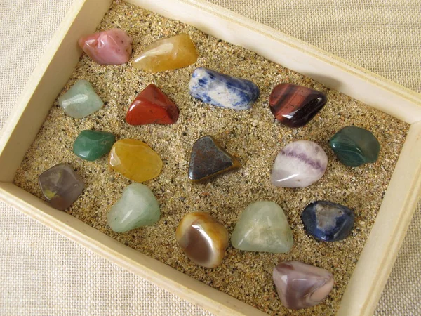 Tumbled Gemstones Wooden Box Sand — Stock Photo, Image