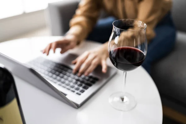 Virtual Wine Tasting Dinner Event Using Laptop
