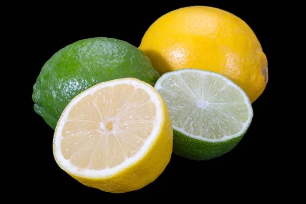 Цитрусовые Плоды Желтого Лимона Зеленой Извести Цельные Половина Изолированные Черном — стоковое фото