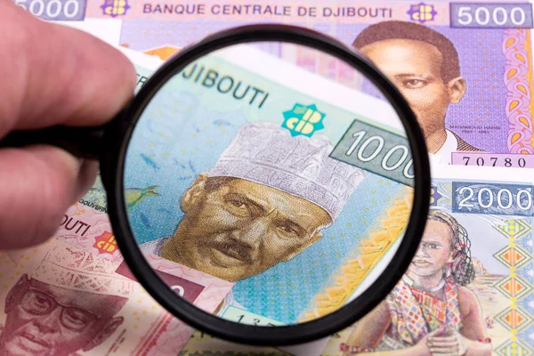 Geld Aus Dschibuti Francs Vergrößerungsglas — Stockfoto