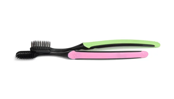 Brosses Dents Plastique Rose Vert Isolées Sur Fond Blanc Gros — Photo