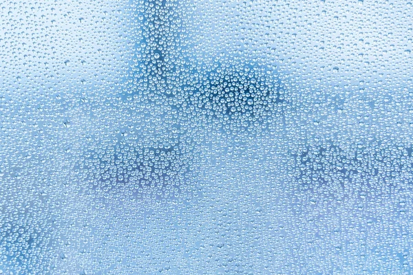 Υγρό Γυαλί Μεγάλες Σταγόνες Νερού Βροχή Μπλε Χρώματος Ιστορικό Ταπετσαρία — Φωτογραφία Αρχείου