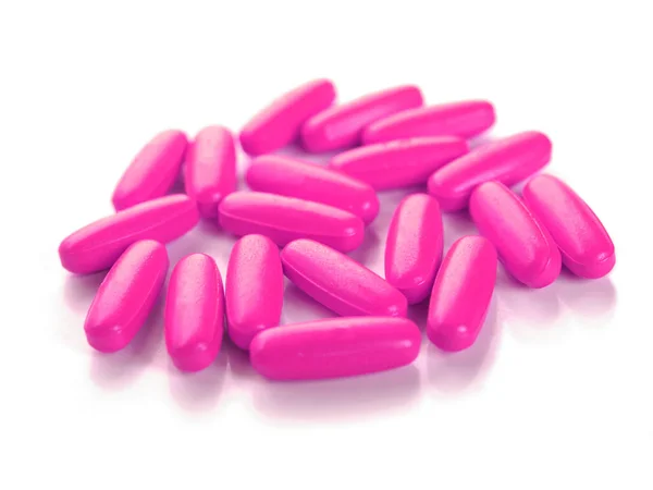 Różowe Tabletki Izolowane Białym Tle — Zdjęcie stockowe