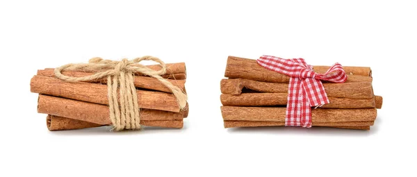 Dry Cinnamon Sticks Tied Red Ribbon Spice Isolated White Background — Stock Photo, Image