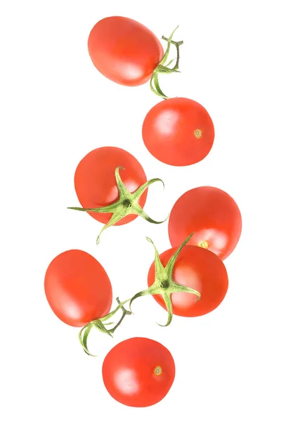 Odizolowane Warzywa Siedem Całych Pomidorów Powietrzu Biało Ścieżką Wycinania Jako — Zdjęcie stockowe