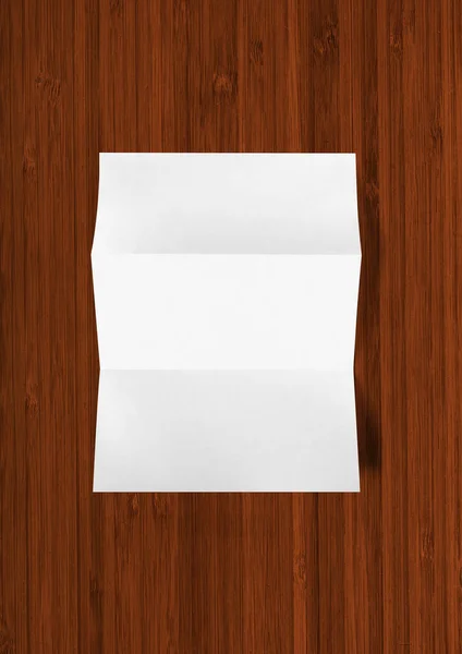 Prázdné Složené Bílé Papír List Maketa Šablona Izolované Tmavém Dřevěném — Stock fotografie