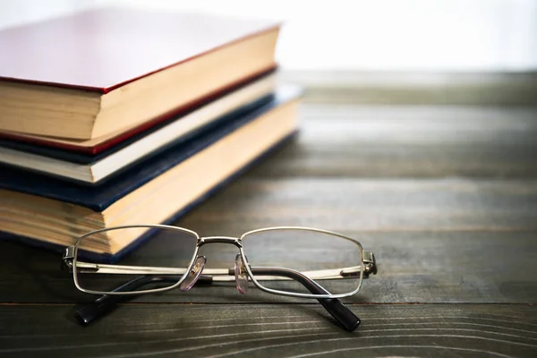 Stack Books Glasses Wooden Table — Stock Photo, Image