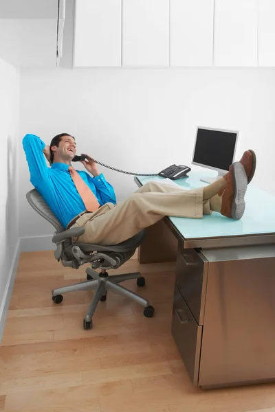 Young Man Sitting Office Chair Talking Phone — Stock Photo, Image