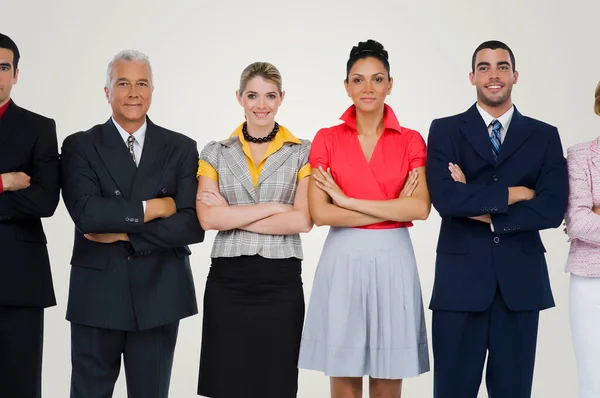 Group Business People Standing Front Row Arms Crossed Large Hall — Stock Photo, Image