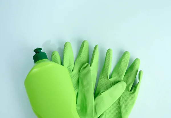 Green Rubber Gloves Cleanin Cleaning Fluid Plastic Bottle Blue Background — Stock Photo, Image