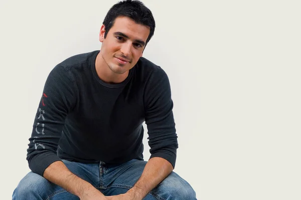 Portrait Handsome Young Man Sitting Sofa Looking Camera — Stock Photo, Image