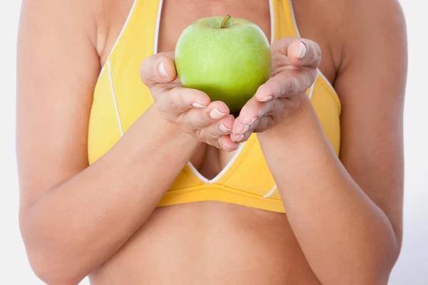 Kvinna Med Ett Grönt Äpple Vit Bakgrund — Stockfoto