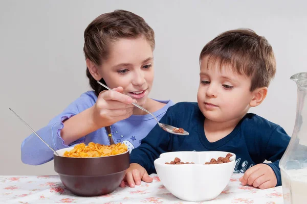 Cute Little Boy Eating Porridge Spoon Smiling — Stock Photo, Image