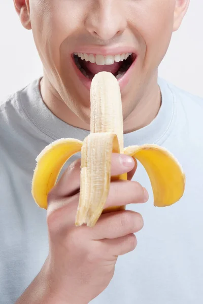 Vrouw Met Een Banaan Geïsoleerd Witte Achtergrond — Stockfoto