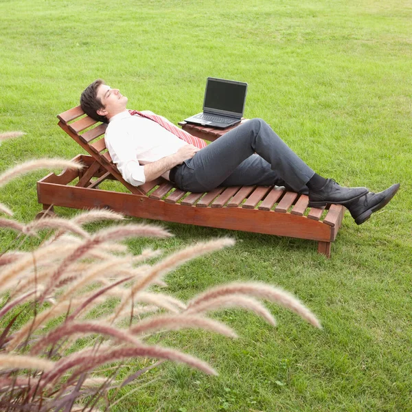 Young Man Lying Grass Working Laptop — Stock Photo, Image
