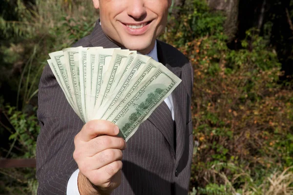 Mężczyzna Trzyma Pieniądze Ręce — Zdjęcie stockowe