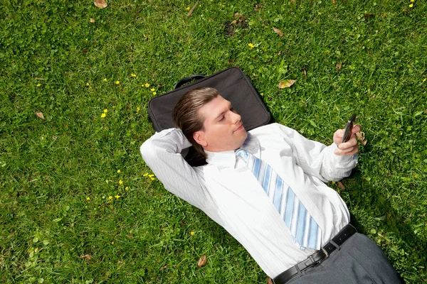 Young Man Lying Grass Listening Music — Stock Photo, Image