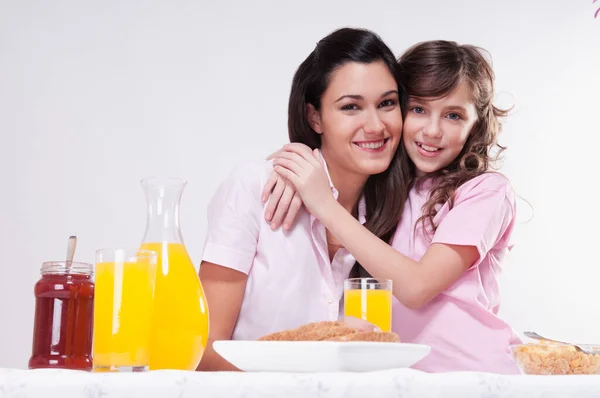 Happy Family Two Daughters Having Breakfast Together Stock Photo