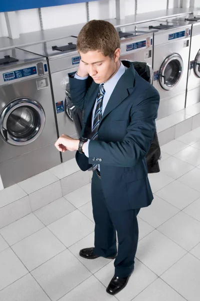 Man Laundry Kitchen Stock Image