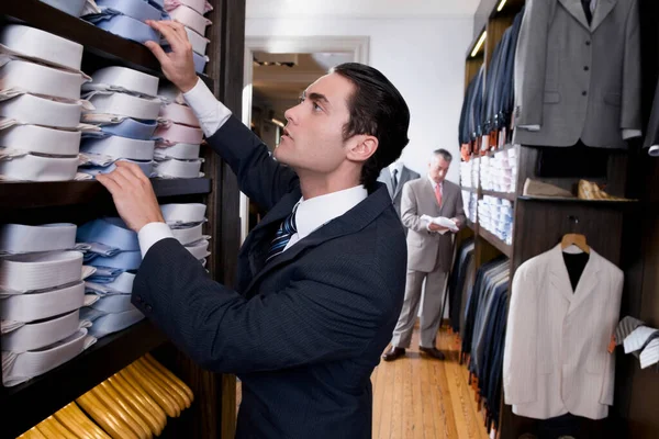 Young Man Choosing Clothes Shop — Stock Photo, Image