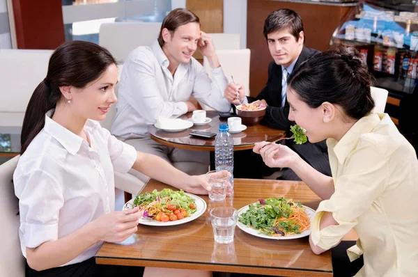 Group Young People Having Lunch Restaurant Royalty Free Stock Images