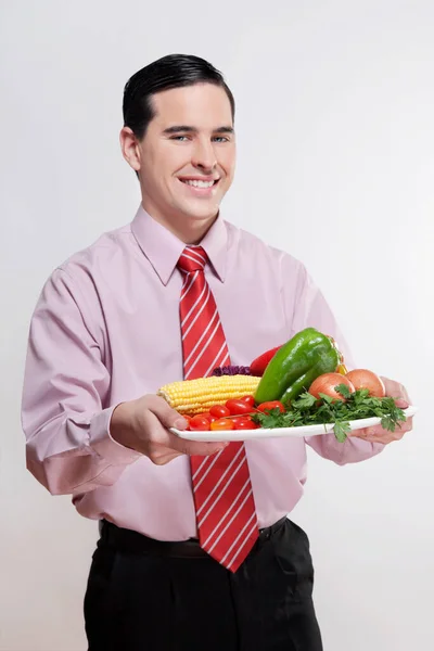 Joven Comiendo Sándwich Con Plato Rojo —  Fotos de Stock